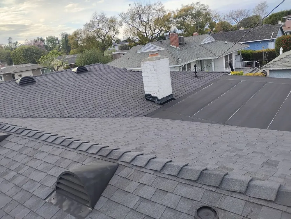 Slide of Sam's Roofing Co