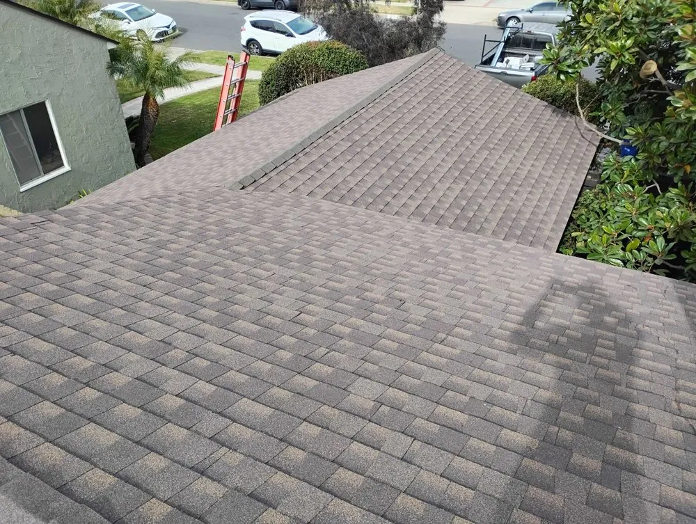 Slide of Sam's Roofing Co