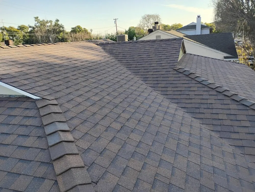 Slide of Sam's Roofing Co