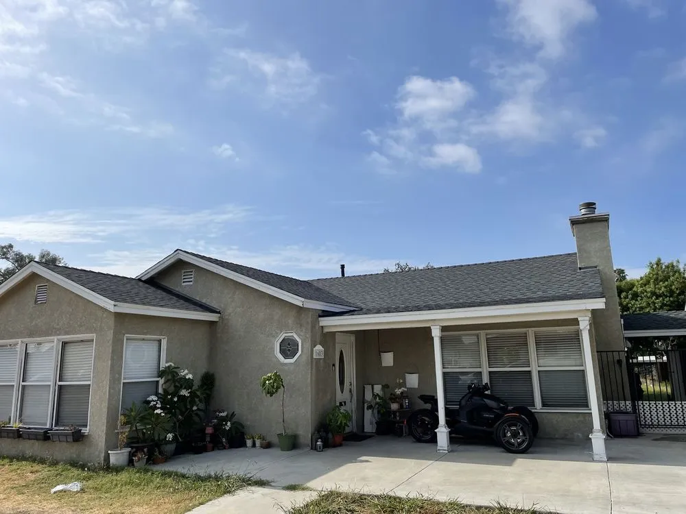 Slide of Sam's Roofing Co