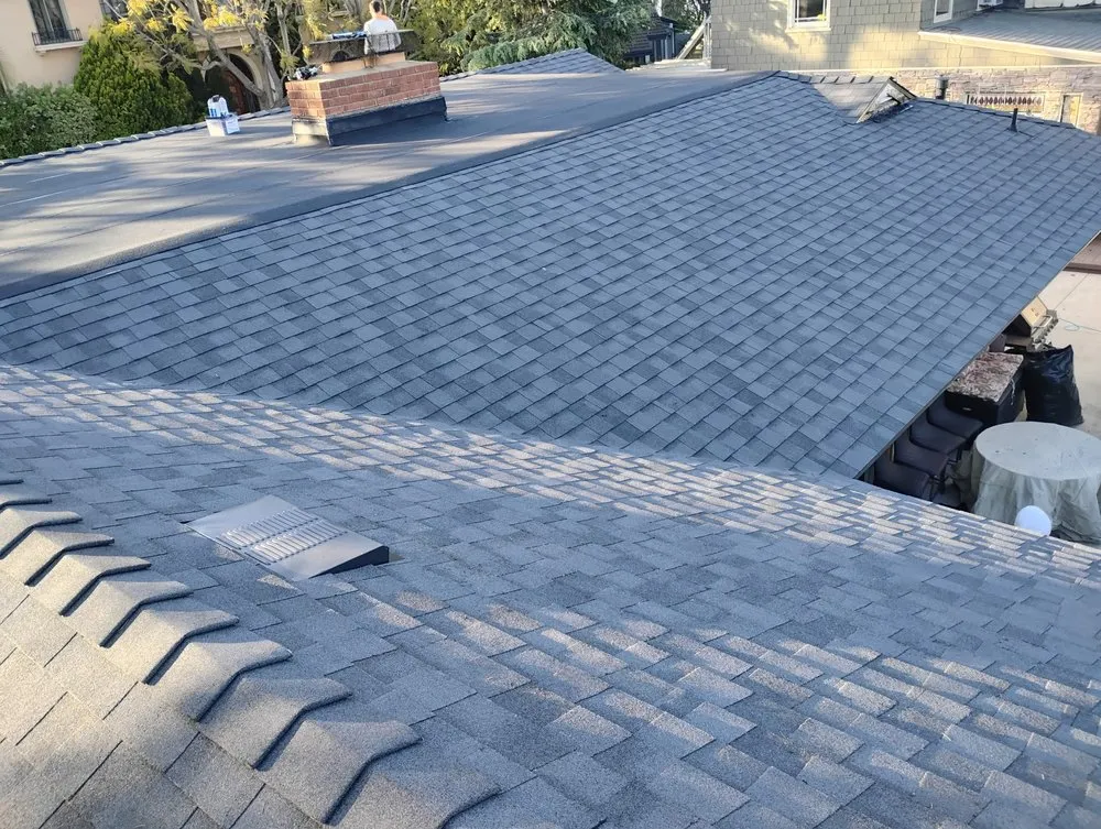 Slide of Sam's Roofing Co