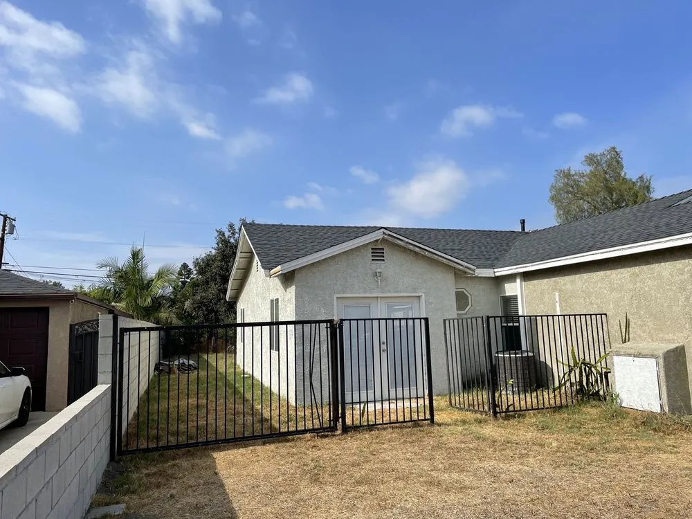 Slide of Sam's Roofing Co