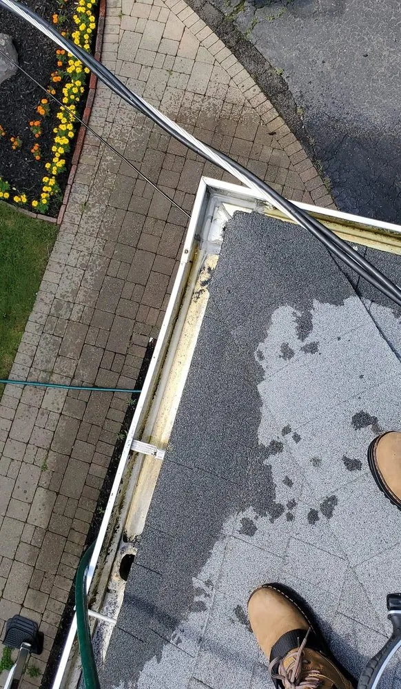 Slide of San Diego's Spotless Roof Maintenance