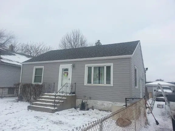 Slide of Sanchez Roofing & Construction