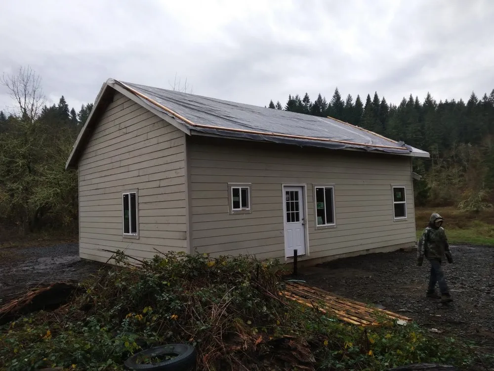 Expert shingle roofing service for residential properties in Scio, OR by Sandberg Construction