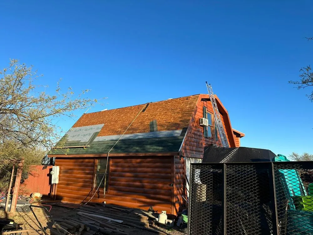 Slide of Sandflat Roofing
