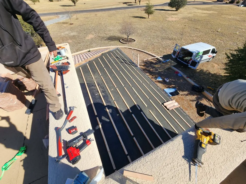 Slide of Sandflat Roofing
