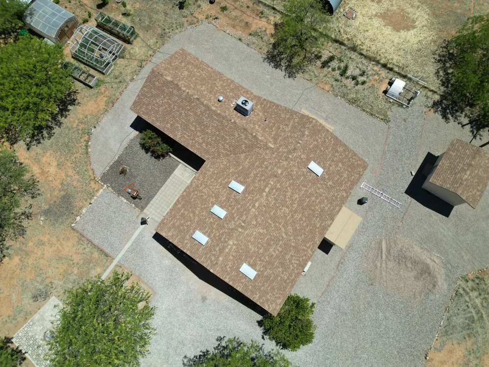 Slide of Sandflat Roofing