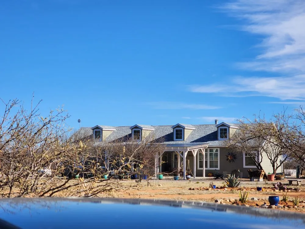 Slide of Sandflat Roofing