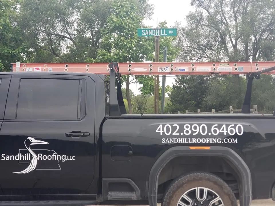 Slide of Sandhill Roofing