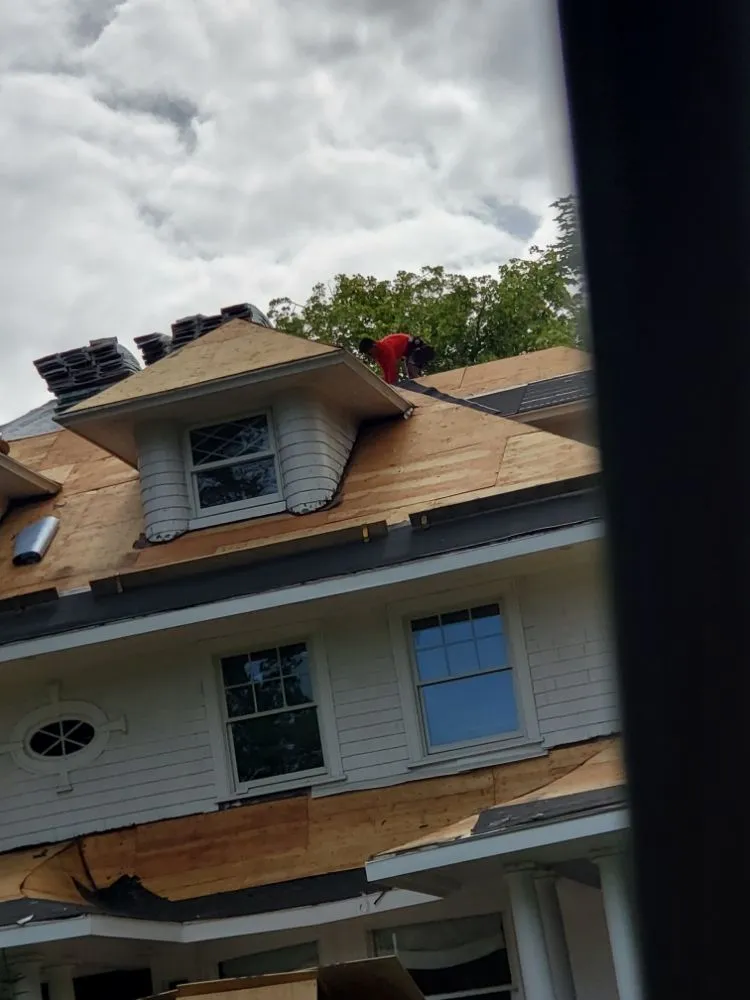 Slide of SANDOVAL ROOFING & SIDING