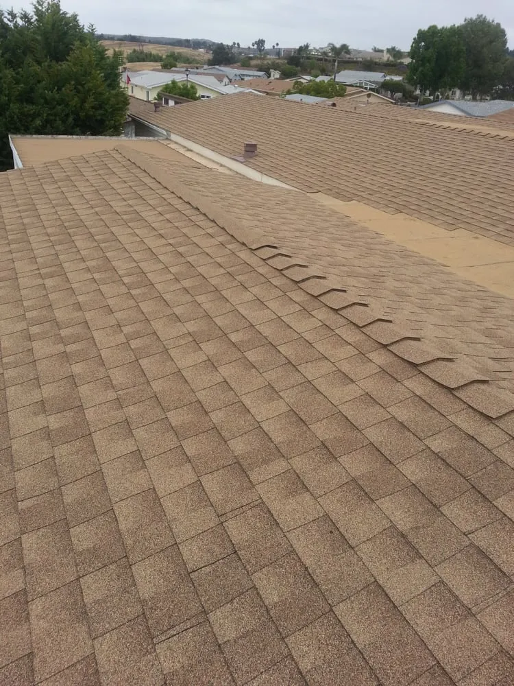 Slide of Sandoval Roofing