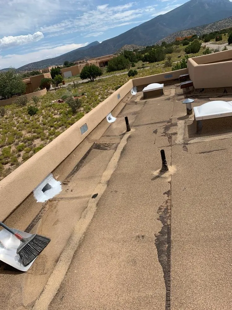 Slide of Sangre De Cristo Roof Company