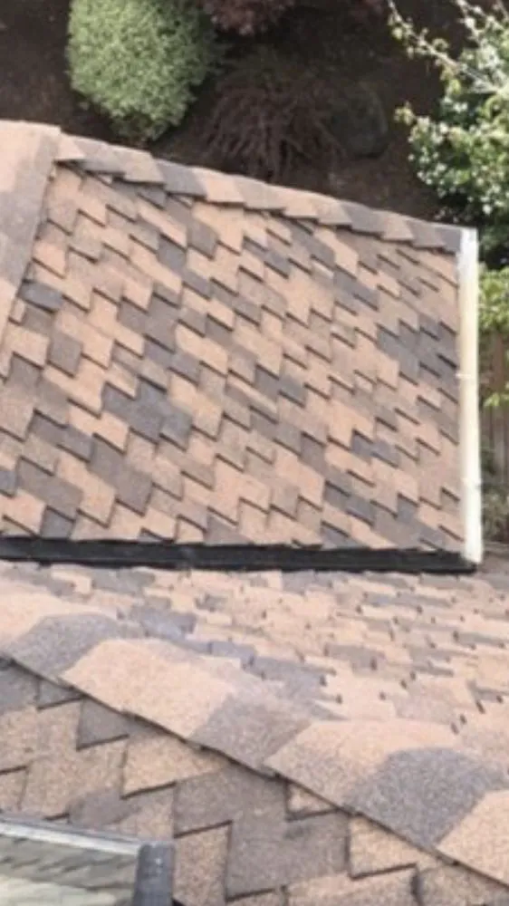 Slide of Sani Roofing & Construction