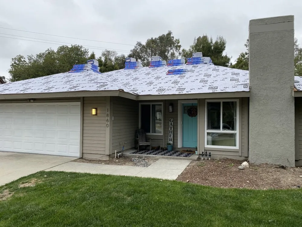 Slide of Santa Fe Roofing