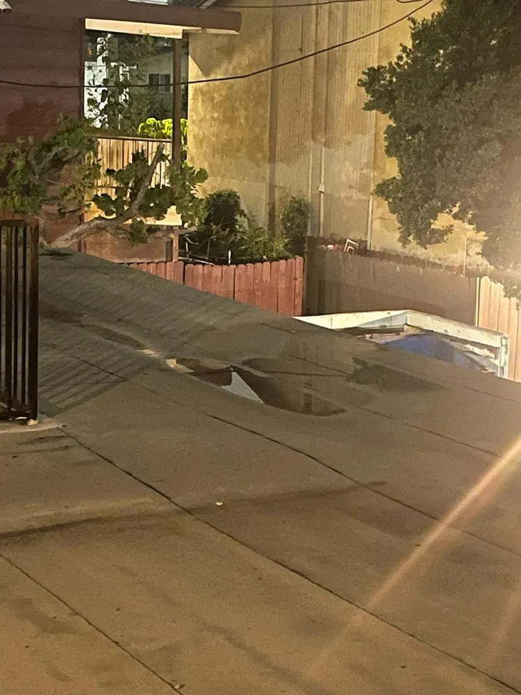 Slide of Santiago Roofing