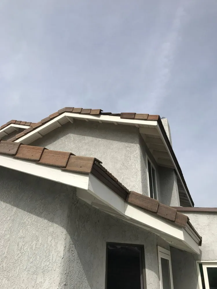 Slide of Santiago Roofing