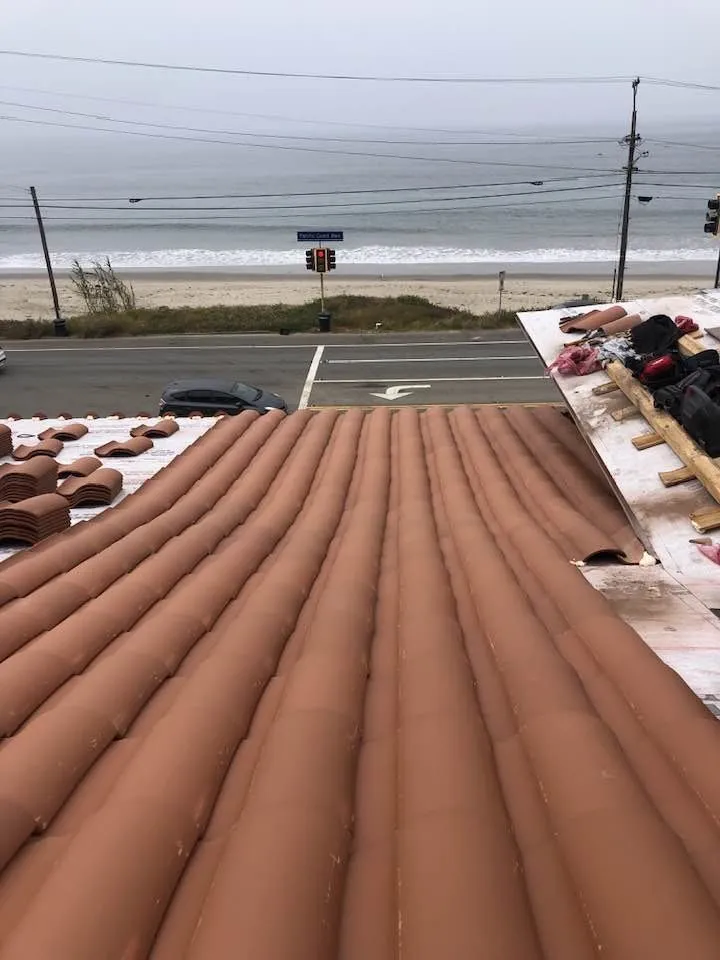 Slide of Santiagos Roofing