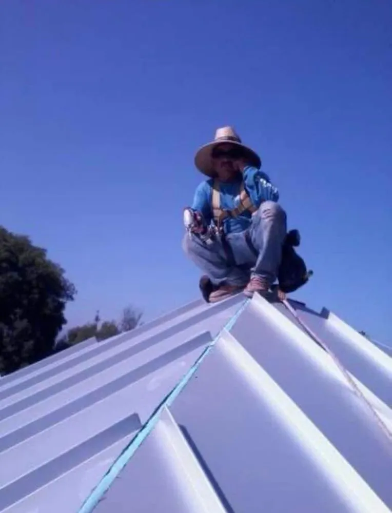 Slide of Santiagos Roofing