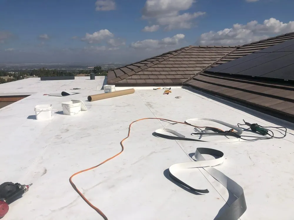 Slide of Santiagos Roofing