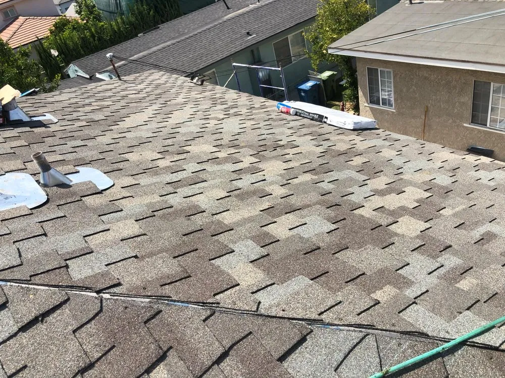 Slide of Santiagos Roofing