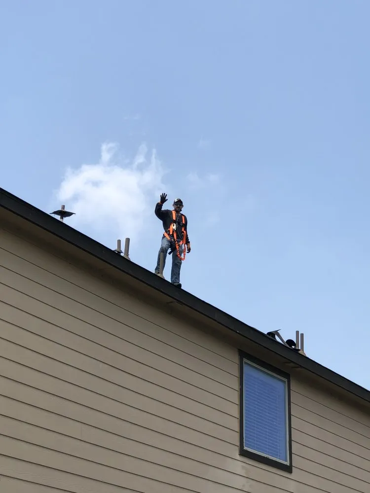 Slide of Santos Roofing