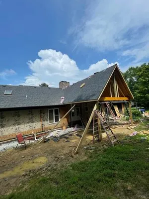 Santos T Construction Logo