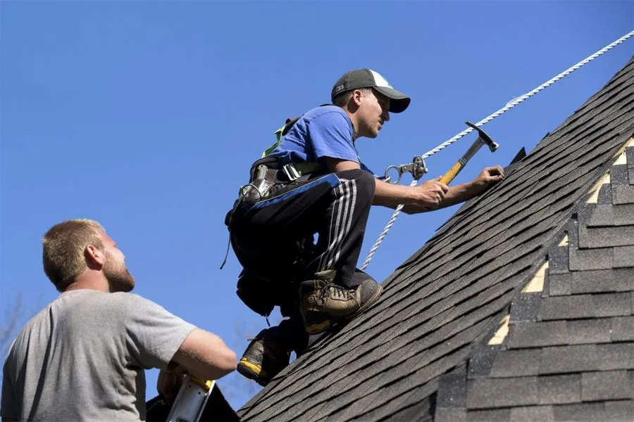 Local roof replacement after storm damage in St. Petersburg, FL by Saranovic and Sons Construction and Roofing