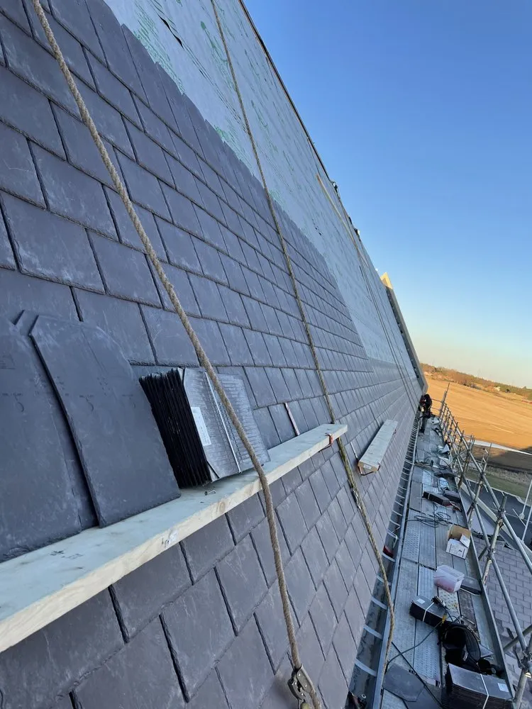 Slide of Sarmiento Roofing