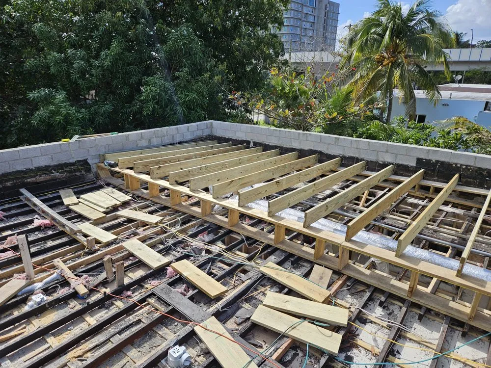 Slide of Sarmiento Roofing Services