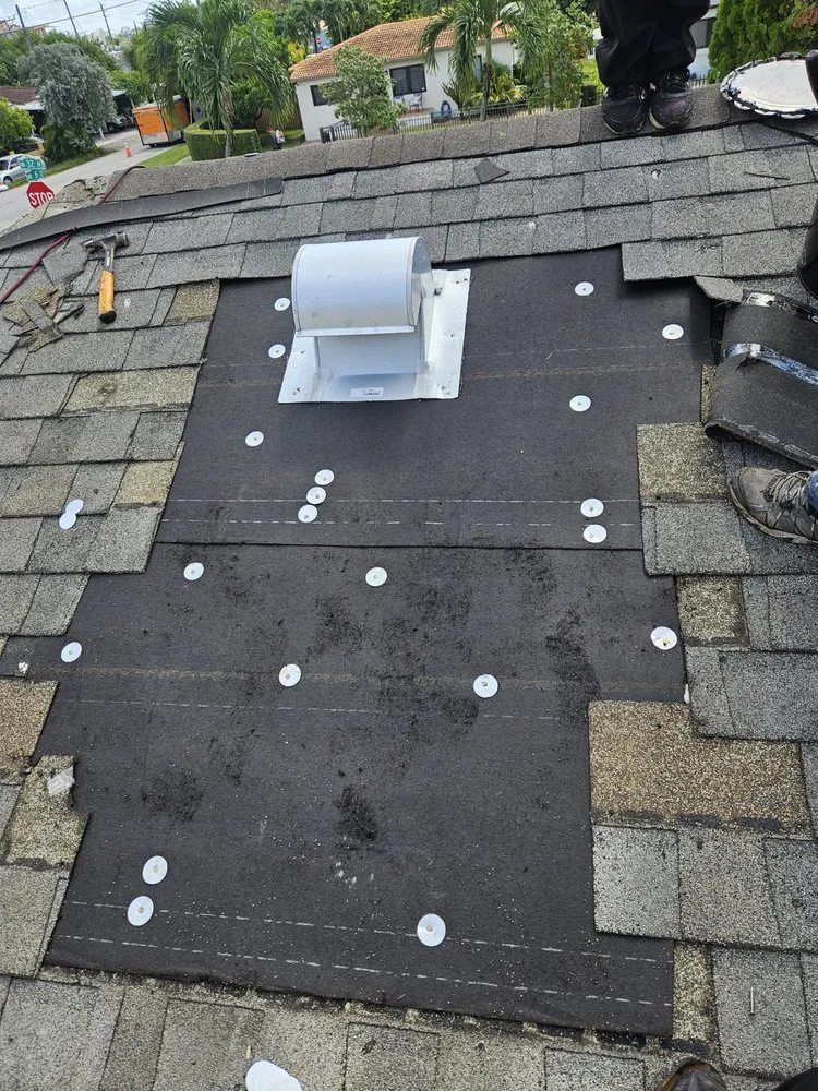 Slide of Sarmiento Roofing Services