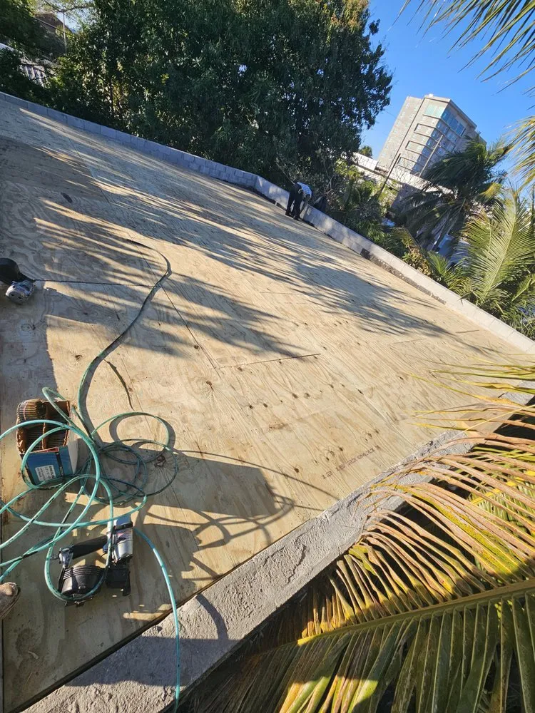 Slide of Sarmiento Roofing Services