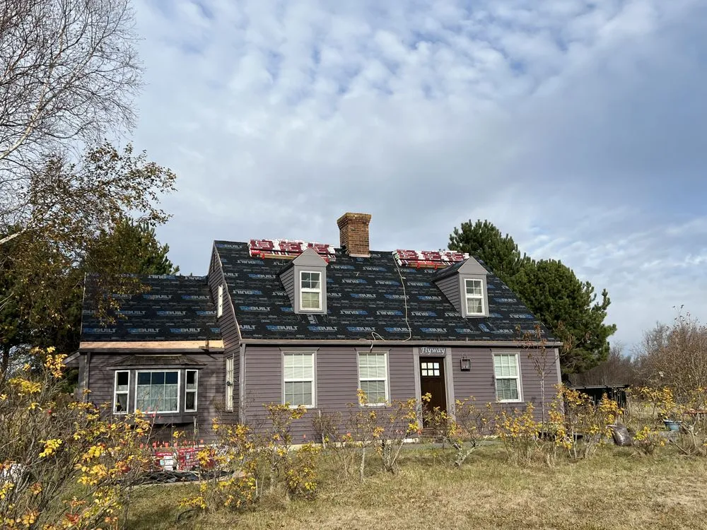 Slide of Savage Roofing