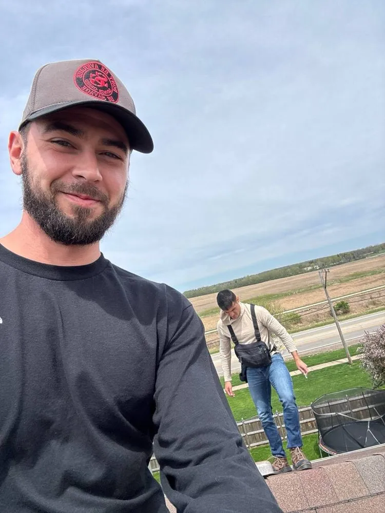 Slide of Savage Roofing