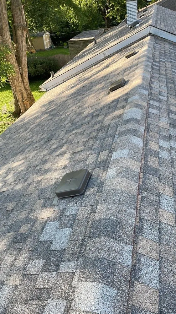 Slide of Savage Roofing