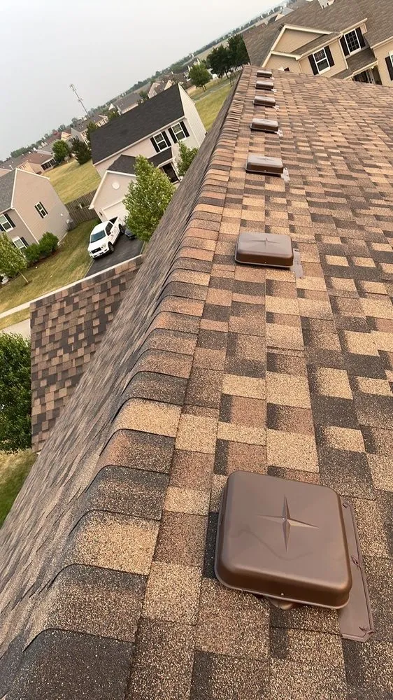 Slide of Savage Roofing