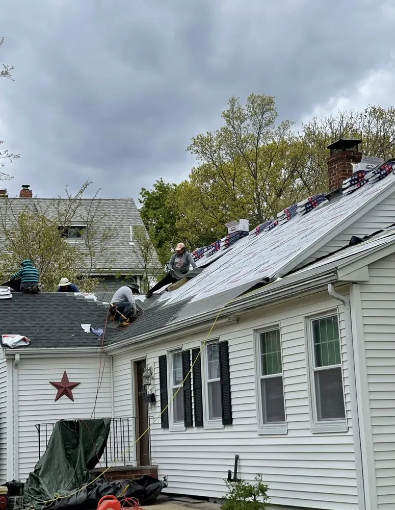 Slide of Savini Roofing