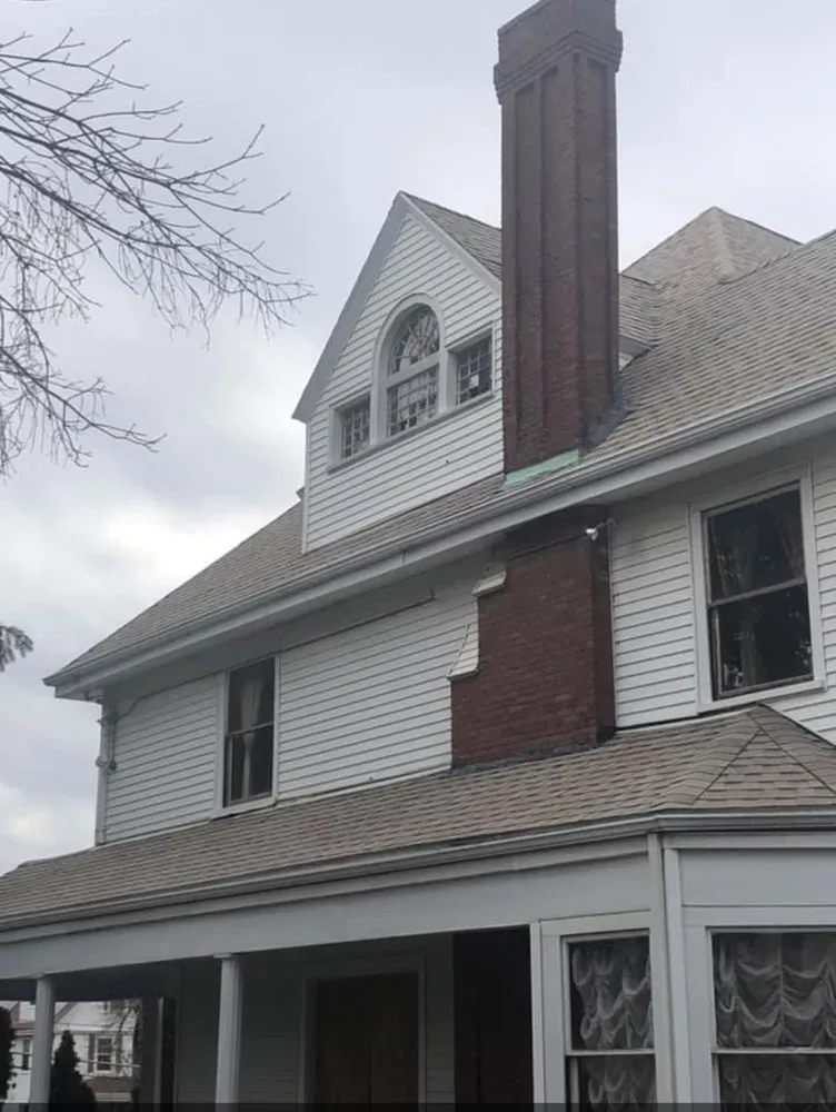 Slide of Savini Roofing