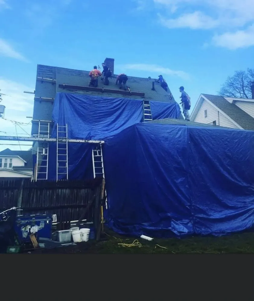 Slide of Savini Roofing