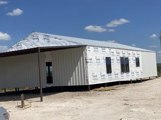 Savior metal buildings Logo
