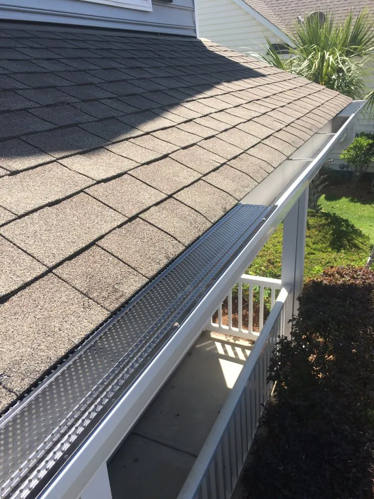 Slide of Saxon Roofing and Gutters