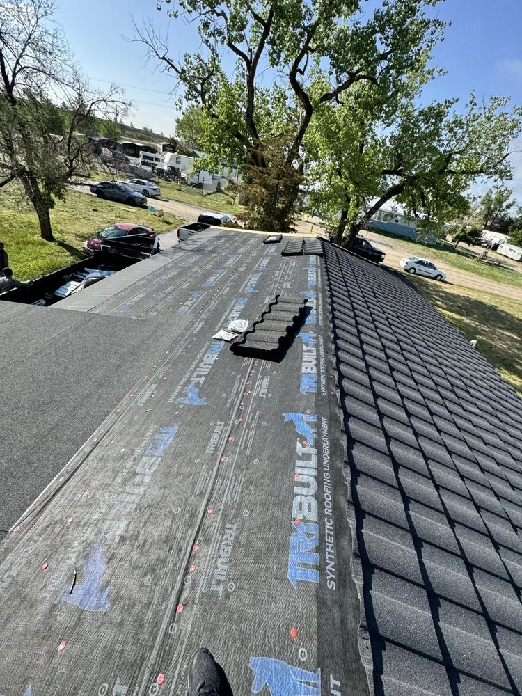 Slide of S&B Roofing