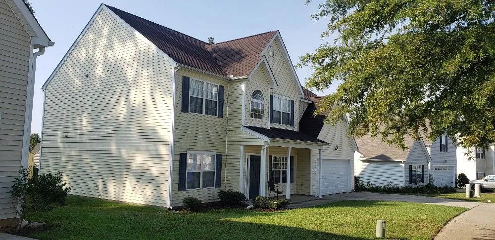 Slide of S&B Roofing Services