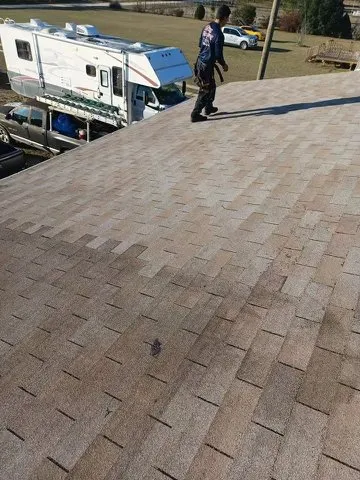 Slide of S&B Roofing