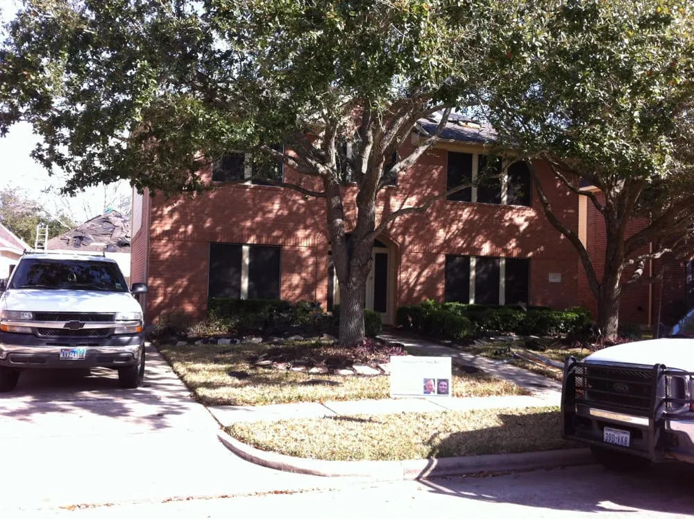 Slide of S&B Tip-Top Roofing