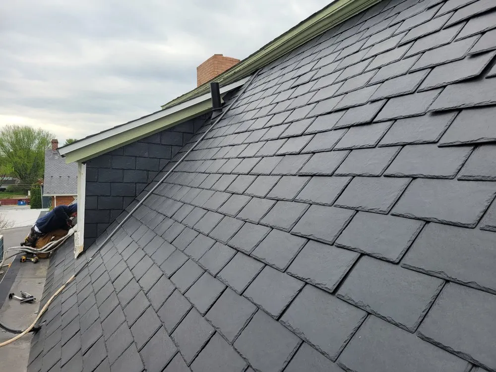 Slide of Scheurich Roofing