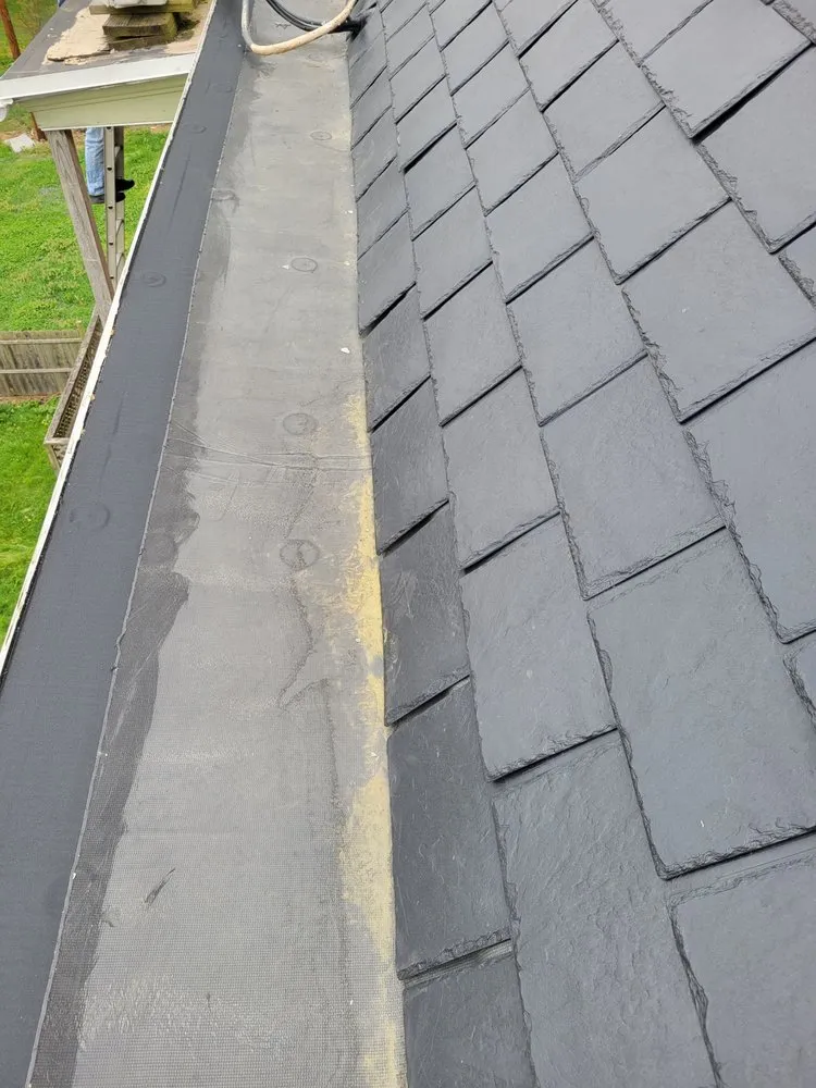 Slide of Scheurich Roofing