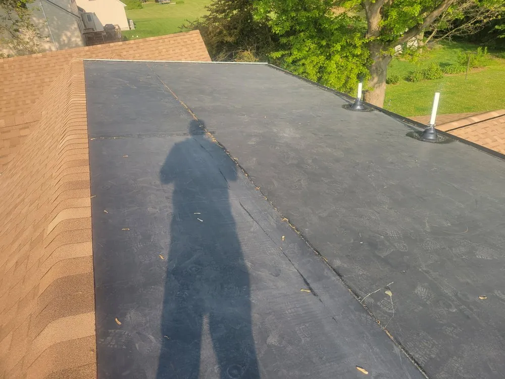 Slide of Scheurich Roofing