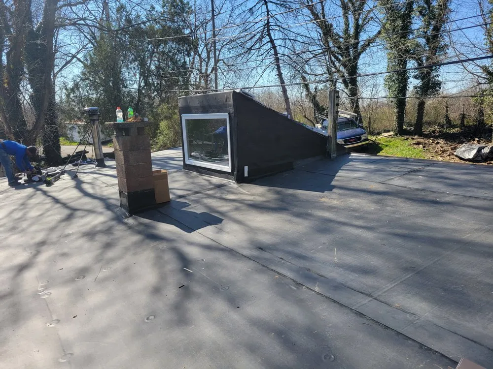 Slide of Scheurich Roofing