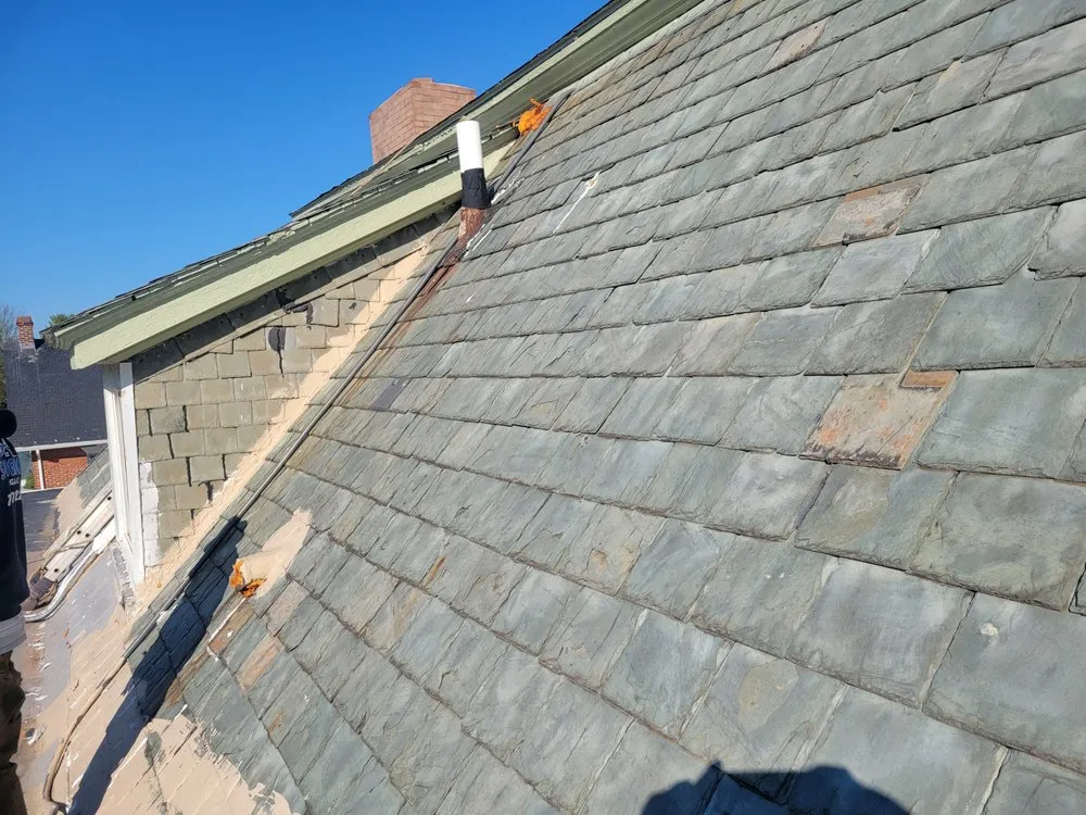 Slide of Scheurich Roofing